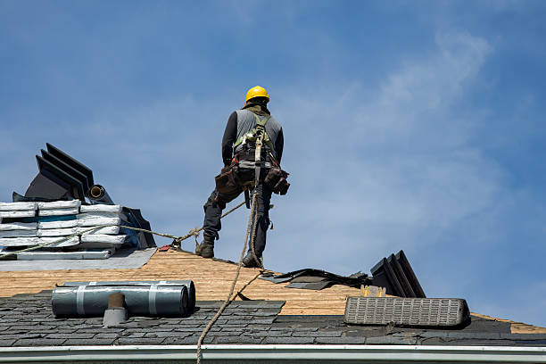 Professional Roofing technician working in Crystal Beach, FL